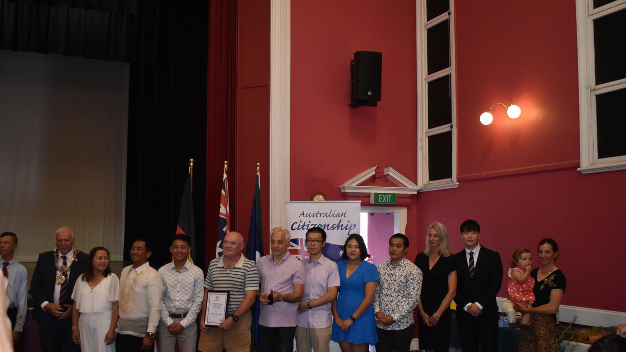 New Australian citizens join Mayor Vic Pennisi after accepting their citizenship (Photo: Warwick Daily News)