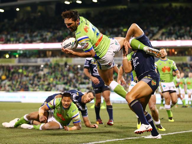 Jordan Rapana scores a high flying try for the Raiders. Picture: Getty Images