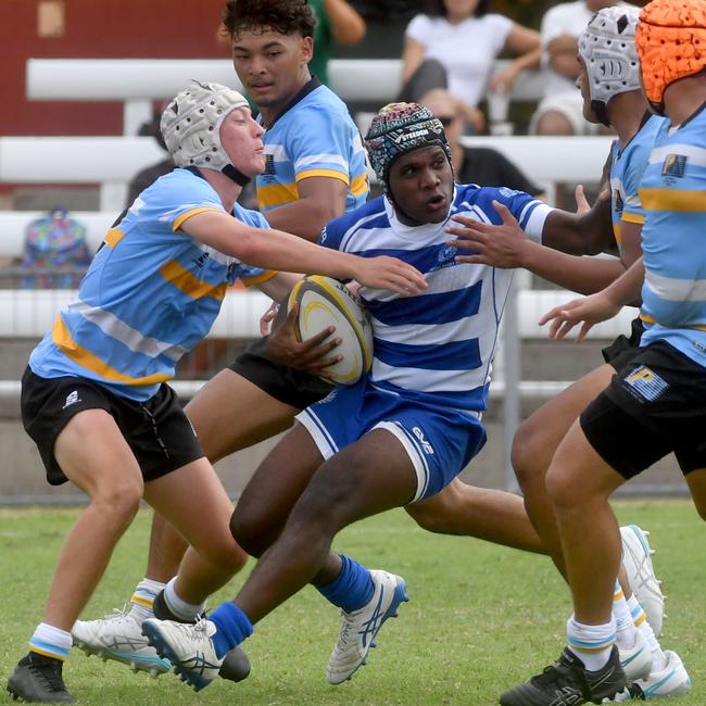 Troy Waike evades tacklers. QLD Rugby Union State Championships (17-18 years boys) at the Townsville Sports Precinct. Friday May 23. Northern against Peninsular. Picture: Evan Morgan