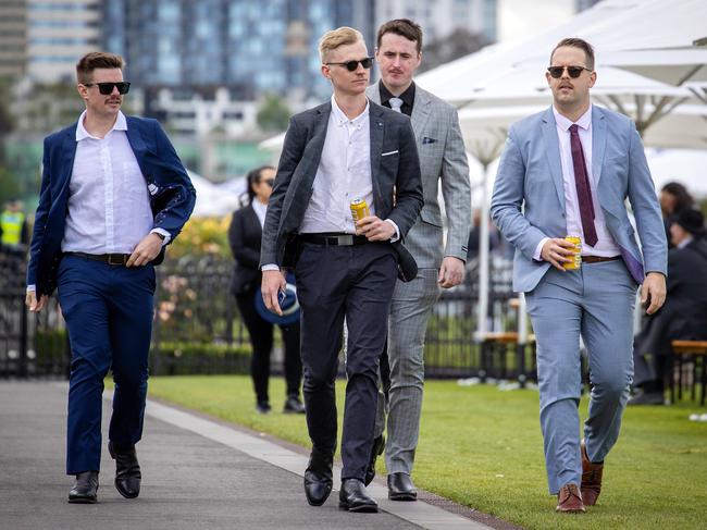 Getting on the beers at Flemington. Picture: Mark Stewart