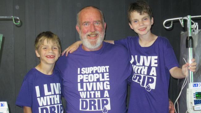 Jordan and Logan Weir with their grandfather Chris Walker. Picture: Supplied