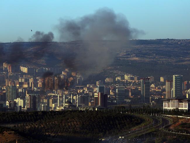 Smoke billows from an area near the presidential palace in Ankara during Saturday’s attempted military coup. Picture: Ali Unal/AP
