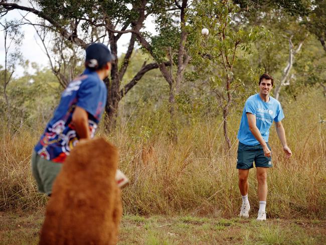 Pat Cummins playing bush cricket at sunrise in the Caranbirini Conservation Reserve. Picture: Sam Ruttyn