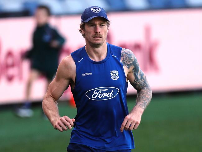 Tom Stewart runs laps at training as he pushes to return to the Geelong side. Picture: Alison Wynd