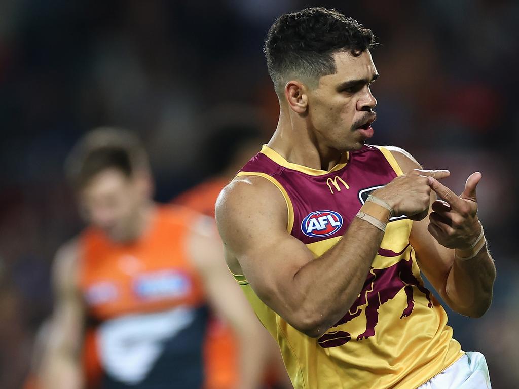 Charlie Cameron keeps track of the goals he scored against GWS. Picture: Cameron Spencer/Getty Images