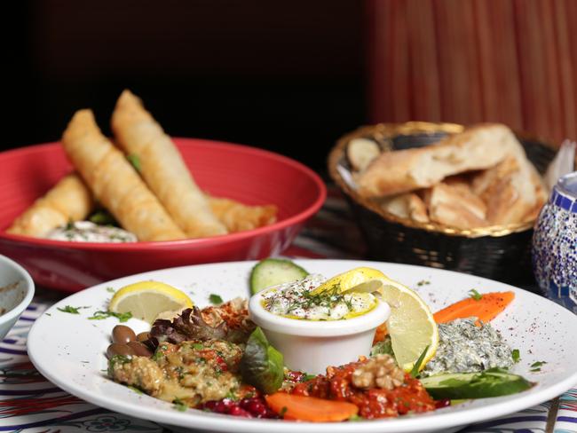 Chef Kristian Vale pictured at Pasha's Lounge in Bondi with Pan-Fried Haloumi, Sigara Burek and Karisik Meze.Picture: Christian Gilles