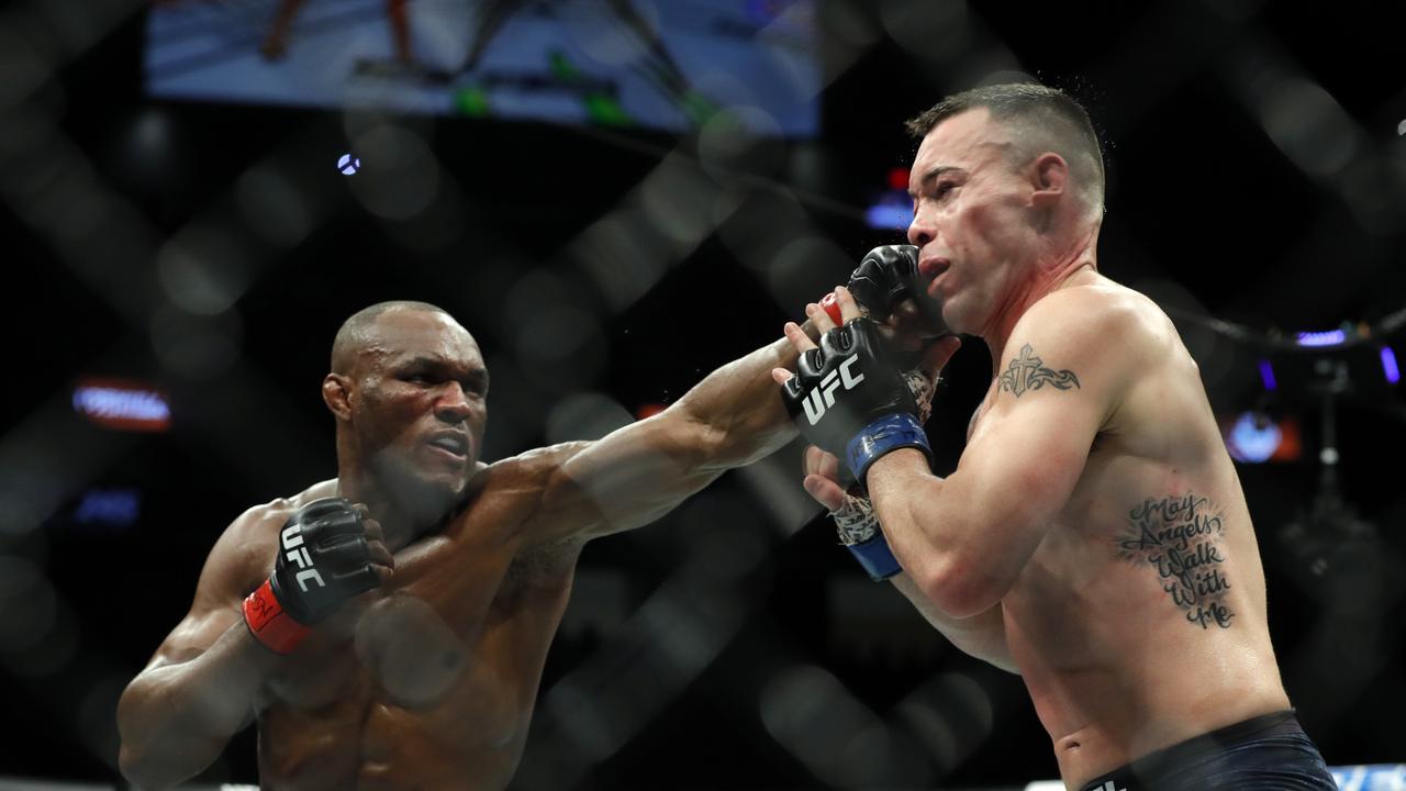 Kamaru Usman lands on Colby Covington at UFC 245. Steve Marcus/Getty Images/AFP