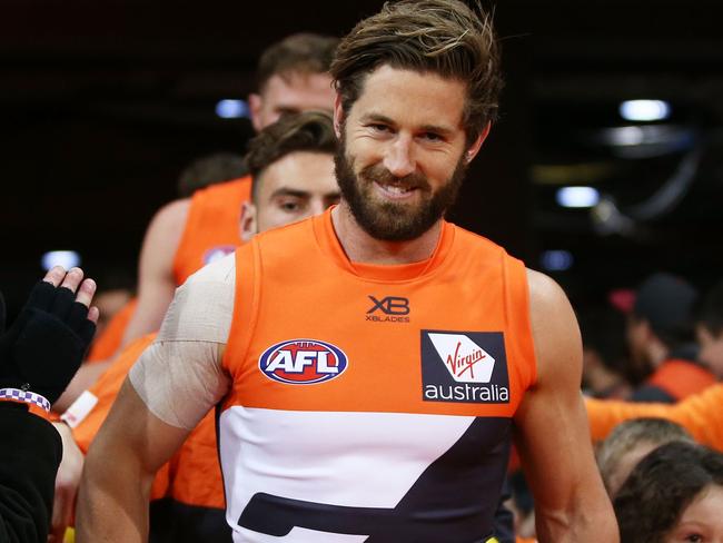 SYDNEY, AUSTRALIA - JULY 14:  Callan Ward of the Giants leads the Giants through the race during the round 17 AFL match between the Greater Western Sydney Giants and the Richmond Tigers at Spotless Stadium on July 14, 2018 in Sydney, Australia.  (Photo by Matt King/Getty Images)