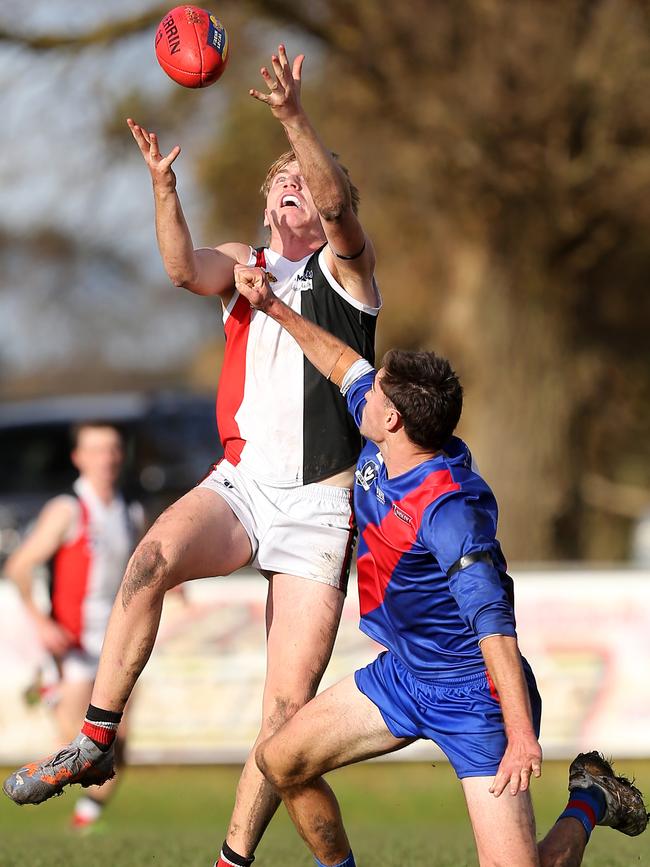 Koroit’s Mitchell Lloyd marks over Terang-Mortlake opponent Dylan Jones.