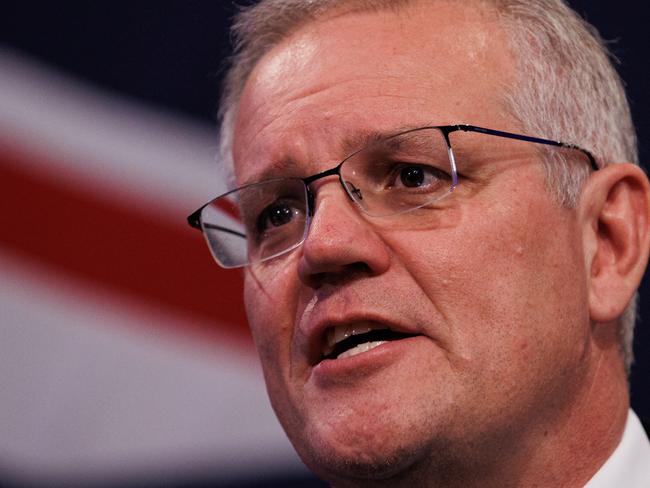 ELECTION TEAM 2022  LIBERAL BUS TOUR  21/5/2022  A man wearing a liberal badge.   Liberal party election night at The Fullerton Hotel Sydney. Where Liberal Party members and fans see Prime Minister Scott Morrison, Jenny Morrison and daughters Abbey and Lily.   Picture: Jason Edwards