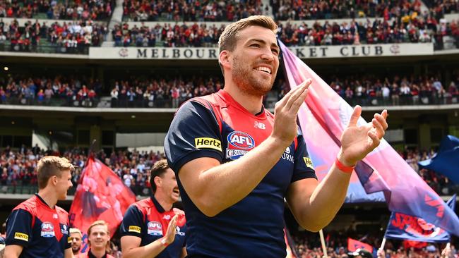 Viney applauds the huge turnout as the Demons walk out onto the field. Picture: Getty Images