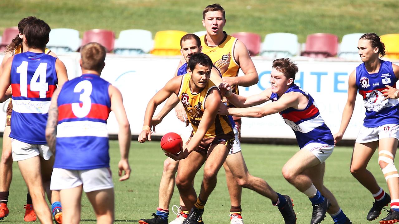 Hawks' Duncan Seden looks for clear air in the AFL Cairns match between the Manunda Hawks and the Centrals Trinity Beach Bulldogs, held at Cazalys Stadium, Westcourt. PICTURE: BRENDAN RADKE