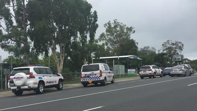 Police at Helensvale State School after a bomb threat put the school into lockdown yesterday.