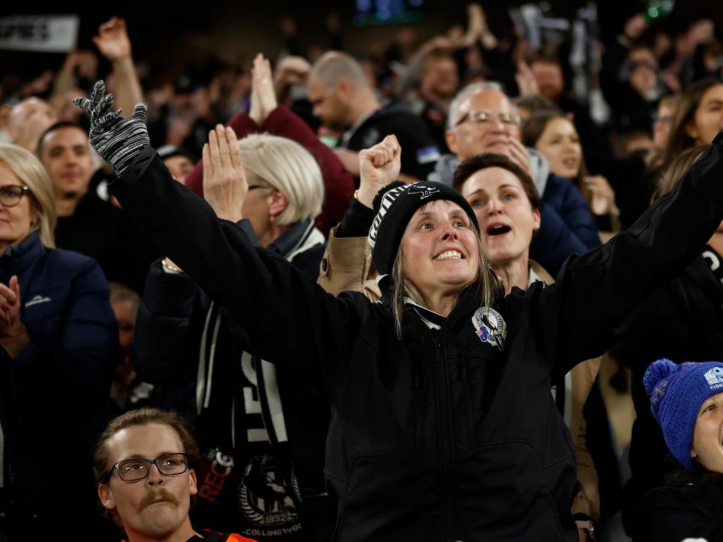 Fans cheer during the 2023 AFL First Preliminary Final match between the Collingwood Magpies and the GWS Giants at Melbourne Cricket Ground last night, where Collingwood prevailed. Picture: Michael Willson/AFL Photos via Getty Images