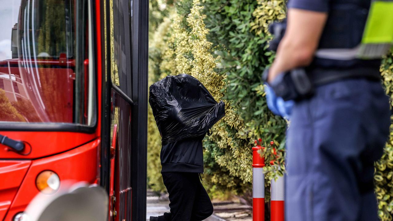 A patient arrives at The Pullman Hotel in Albert Park after being evacuated from the Holiday Inn in the CBD due to water damage. Picture: NCA NewsWire / Ian Currie