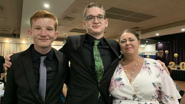 Graduating students from Hervey Bay Special School celebrate their formal.