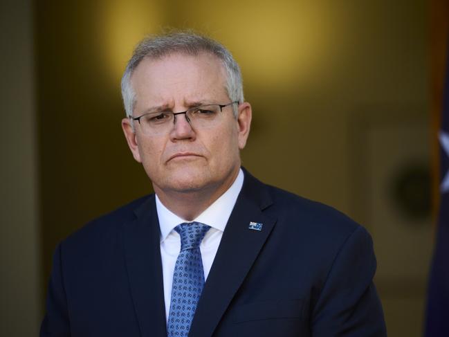 CANBERRA, AUSTRALIA - AUGUST 23: Australian Prime Minister Scott Morrison discusses the Government's plan to 'live with the virus' during a press conference at Parliament House on August 23, 2021 in Canberra, Australia. Federal parliament has resumed in Canberra, despite the ACT being in lockdown due to growing COVID-19 cases. NSW and Victoria are also currently in lockdown as health authorities work to contain the spread of the highly contagious Delta strain of the coronavirus. (Photo by Rohan Thomson/Getty Images)