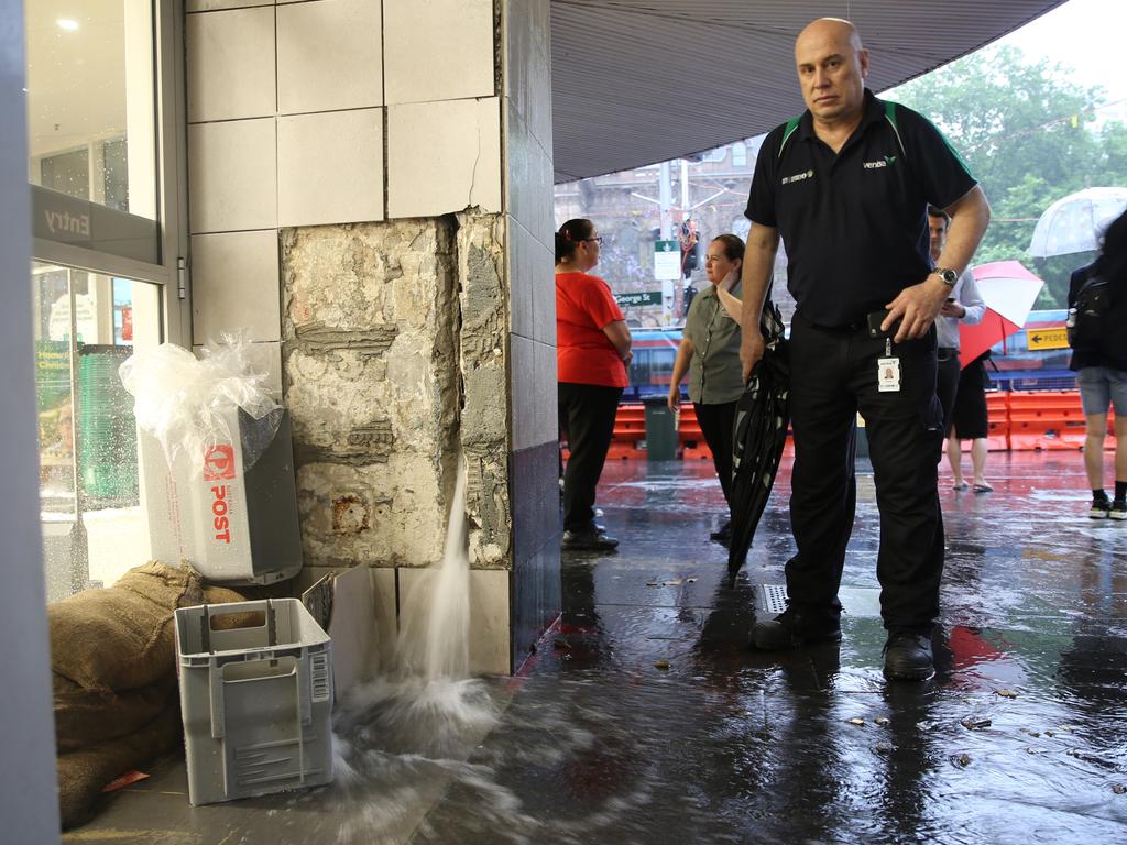 The low hits Sydney at Sunrise . Woolworths at Town hall station is flooding .picture John Grainger