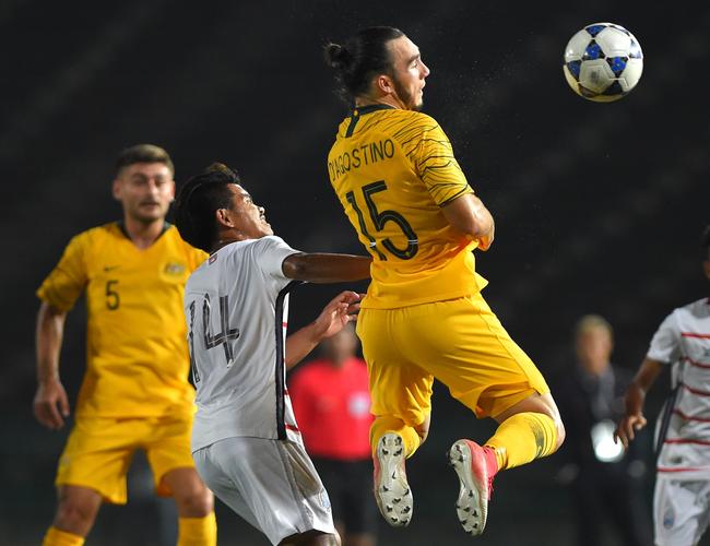 Australia's Nicholas D'Agostino (C) for the Olyroos.