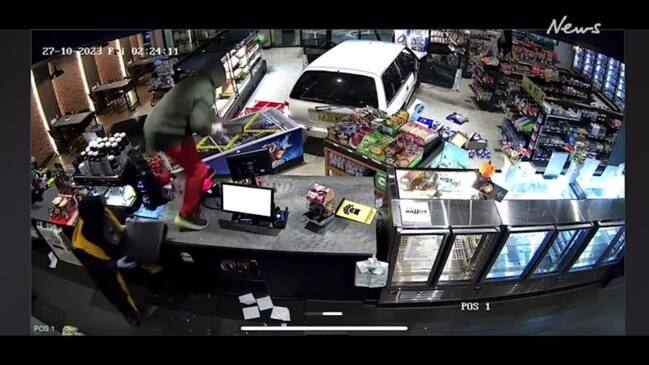 Wild CCTV shows brazen servo robbery