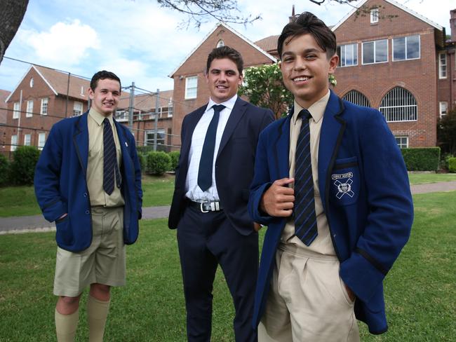 08/02/2019. James Widders-Leece, a 22-year-old Anaiwan man from Armidale, NSW completed Year 12 at Knox Grammar School in Sydney in 2014 on an AIEF Scholarship. He has now returned to Knox as a boarding supervisor and community liaison officer, mentoring young Indigenous students at the school to complete their education and reach their goals. James photographed at Knox Grammar with boys Matthew Stewart, year 11 and Kyh Samuelsson, year 10, pictured in front of the boarding houses. Britta Campion / The Australian