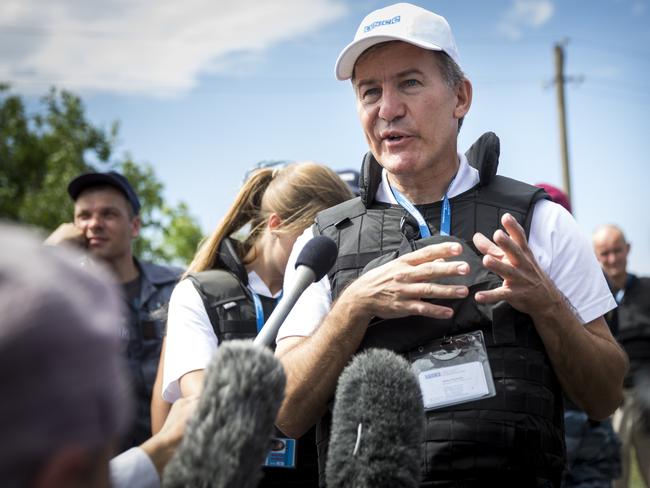 Michael Bociurkiw from monitoring group Organisation for Security and Cooperation in Europe speaks to journalists after inspecting part of the wreckage of Malaysia Airlines flight MH17. Picture: Rob Stothard/Getty Images