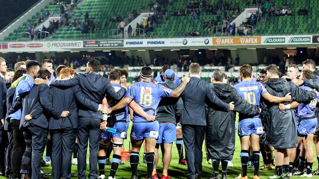 The Force huddle after losing against the Hurricanes in Perth.