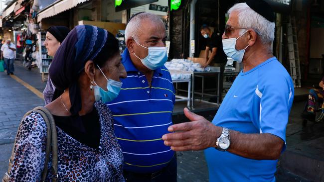 Face masks are back in Israel after authorities tightened restrictions to curb a surge in infections.