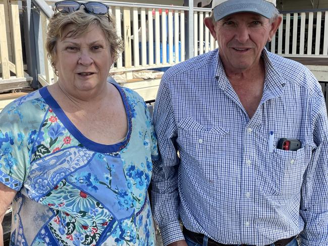 Lesley and Melvin Simpkins stand outside the house on their property on Rossmore Rd. They fear Powerlink's transmission lines will come only within a few hundred metres of their home. Picture: Christine Schindler