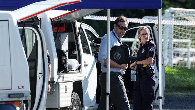 Police at the crime scene where a body has been discovery in a burnt-out car, Greenslopes. Picture: Liam Kidston