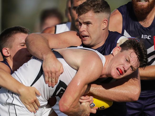 MANDURAH, AUSTRALIA - FEBRUARY 29: Sam Walsh of the Blues is tackled by Sean Darcy of the Dockers during the 2020 Marsh Community Series match between the Fremantle Dockers and the Carlton Blues at David Grays Arena on February 29, 2020 in Mandurah, Australia. (Photo by Will Russell/AFL Photos via Getty Images)