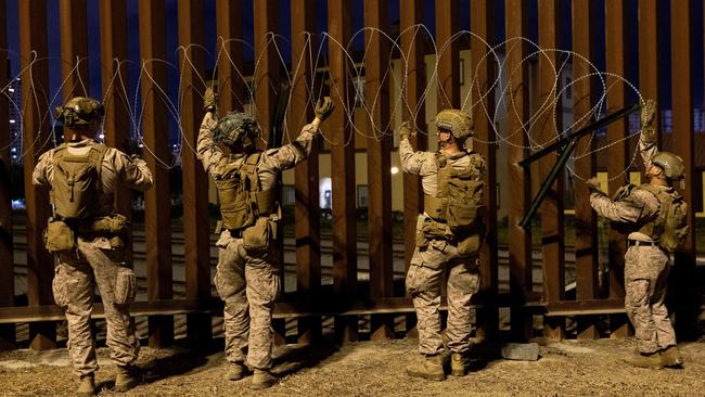 US Marines install concertina wire along the southern border with Mexico near San Ysidro, California, on January 25, 2025.