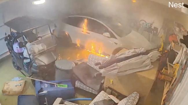 Home footage of a Tesla Model X that caught fire following a storm in the US. Photo: Supplied