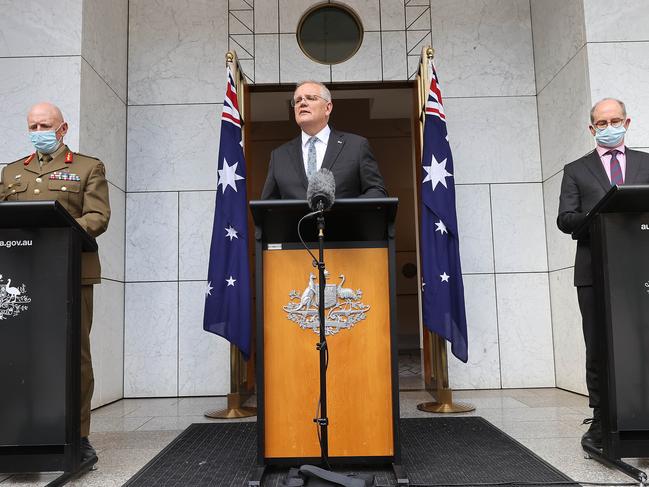 Covid-19 Taskforce Commander, Lieutenant General John Frewen, Prime Minister Scott Morrison and Chief Medical Officer Professor Paul Kelly . Picture: NCA NewsWire / Gary Ramage