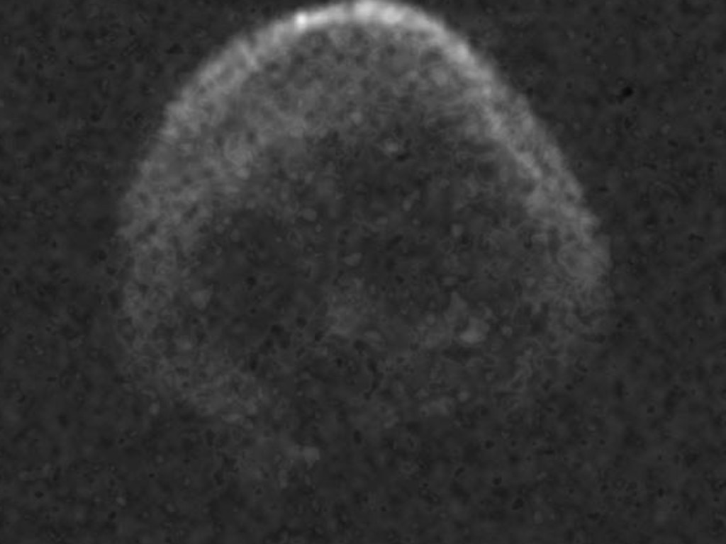 Images of the skull-shaped asteroid travelling through space were captured using the Goldstone telescope in Puerto Rico. Picture: NAIC-ARECIBO/NSF