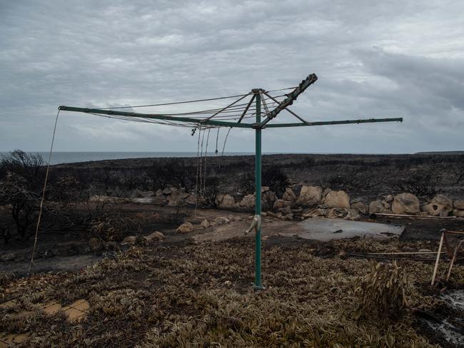 A Hills hoist, all that’s left standing at a holiday shack overlooking Vivonne Bay. Picture: Brad Fleet