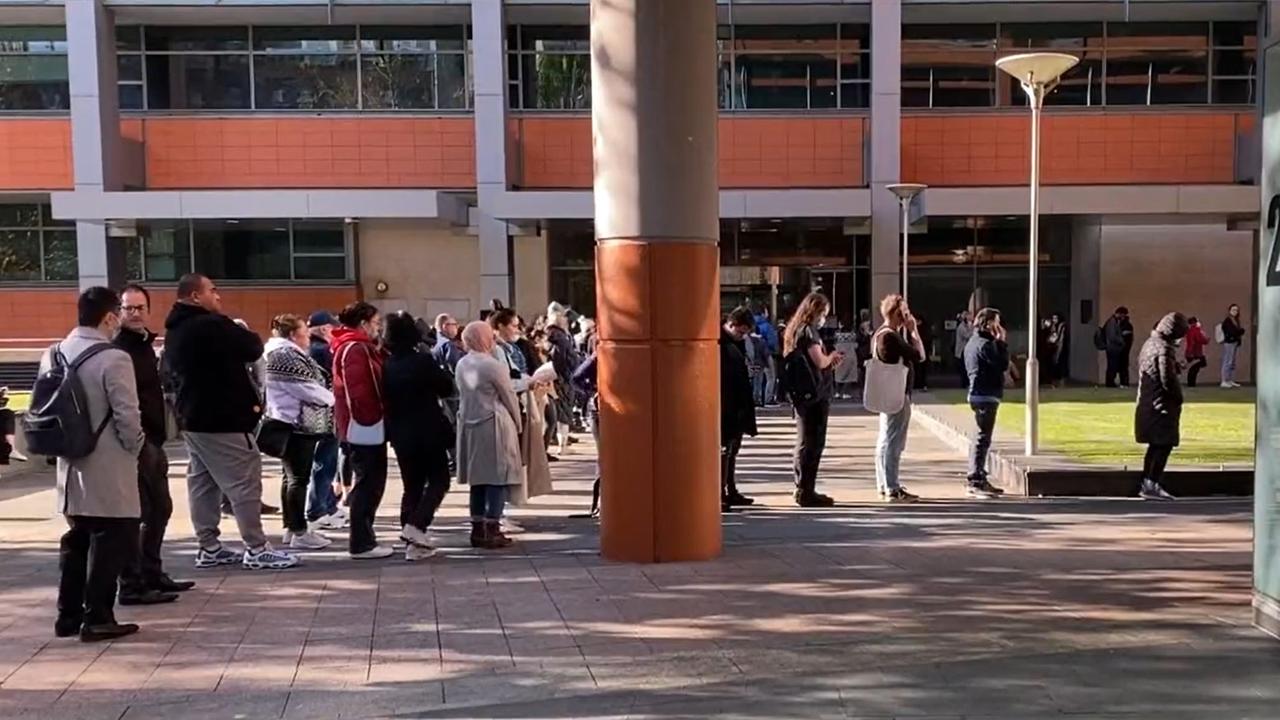 Dozens of applicants braved lengthy lines at the Sydney Passport Office. Picture: 9News