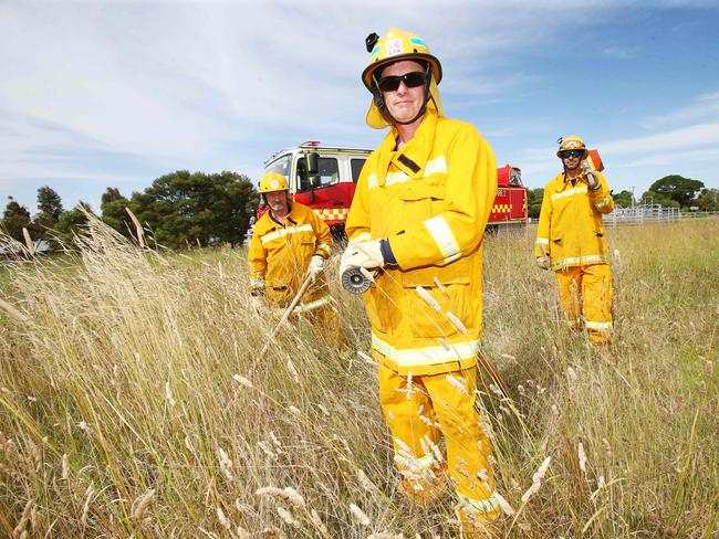 Firefighters Ashley McPhee, Ross Johnson and Neil Hickman from Modewarre CFA. The CFA are warning of high fire risk due to strong growth and hot weather. Picture: Alan Barber