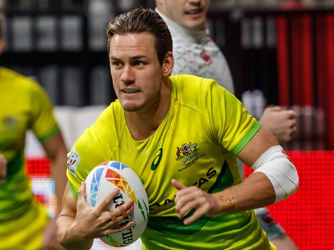 VANCOUVER, BC - MARCH 08: Lachie Anderson #12 of Australia scores in Match #31, Australia vs England (Cup QF 3) during the Canada Sevens, Round 6 of the HSBC World Rugby Sevens Series, held on March 8, 2020, at BC Place in Vancouver, Canada. (Photo by Allan Hamilton/Icon Sportswire via Getty Images)