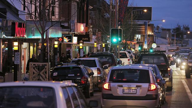 North Hobart's restaurant strip is apparently choked with Uber Eats drivers ramping—occupying parking spaces until they get an order to collect.Picture: MATHEW FARRELL