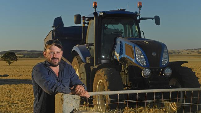 Jarred Tilley, reaping wheat and barley North of Kapunda. Picture: Tom Huntley