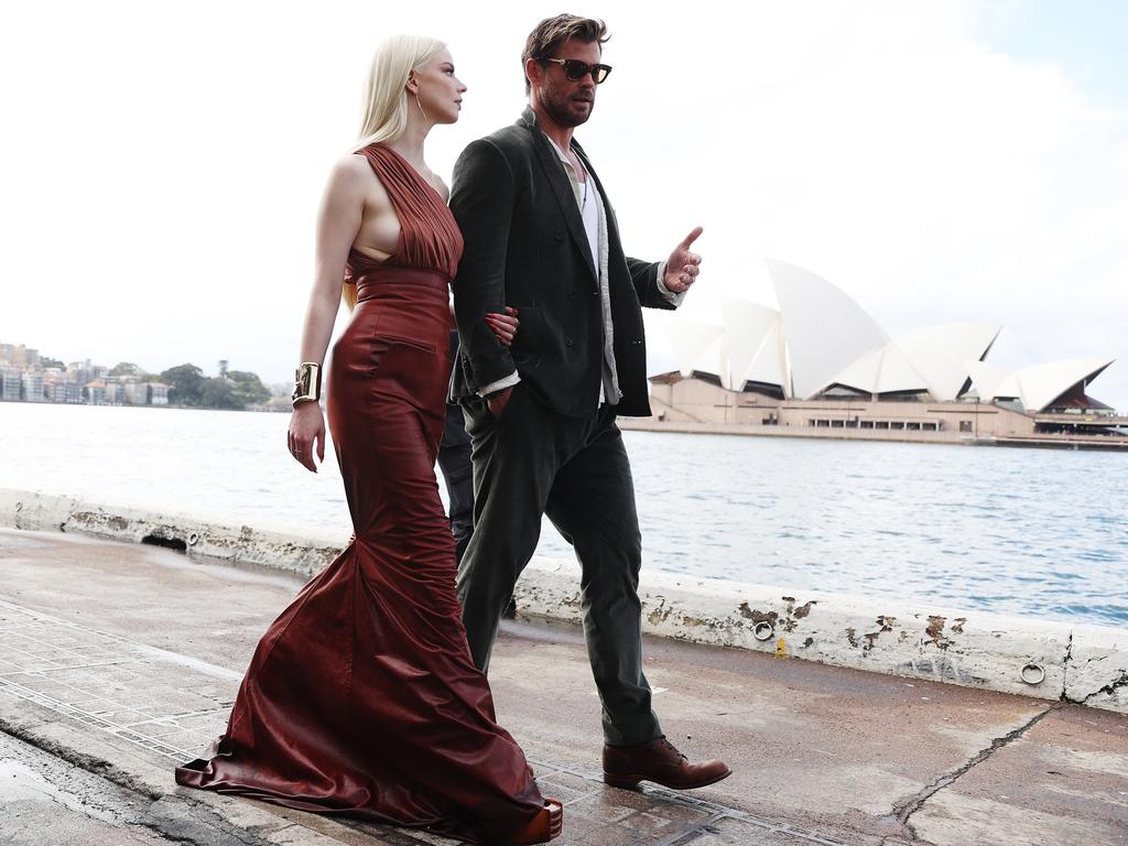 Anya Taylor-Joy and Chris Hemsworth chat as they take a break from promoting their new film "Furiosa: A Mad Max Saga" at Circular Quay in Sydney. Picture: Brendon Thorne/Getty Images