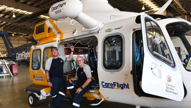 Careflight NT rescue helicopter crewmen flight nurse Paul Campbell, let, and pilot Jamie Humphreys, who were involved in the rescue of the three crash victims. Picture: Katrina Bridgeford