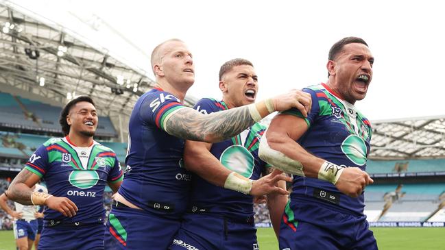 SYDNEY, AUSTRALIA - JULY 06: Marcelo Montoya of the Warriors celebrates with team mates after scoring a try during the round 18 NRL match between Canterbury Bulldogs and New Zealand Warriors at Accor Stadium, on July 06, 2024, in Sydney, Australia. (Photo by Matt King/Getty Images)