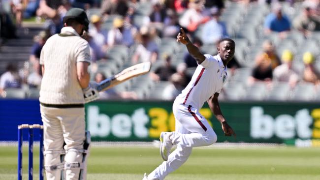 Shamar Joseph celebrates after taking the wicket of Steve Smith. Picture: Izhar KHAN / AFP