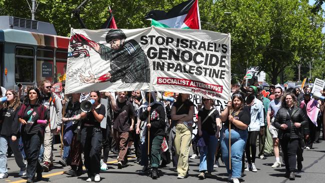 A student protest calling for Israel to end the war in Palestine held at the US Consulate in Melbourne marches down St Kilda Road. Photo: NCA NewsWire / David Crosling.