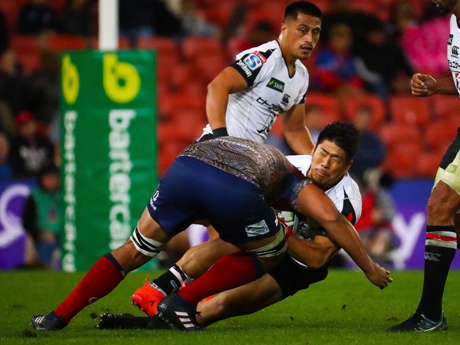 Caleb Timu rocks Rikiya Matsuda. Picture: AFP