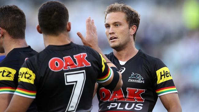 Nathan Cleary and Matt Moylan of the Panthers celebrate a try.