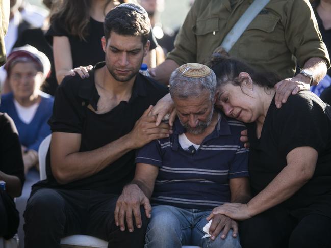 Family and friends attend the funeral of A fallen Israeli soldier. Picture: Amir Levy/Getty Images