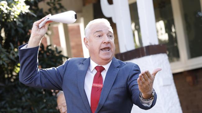 Auctioneer Michael Carolan in action. Picture: Chris Pavlich